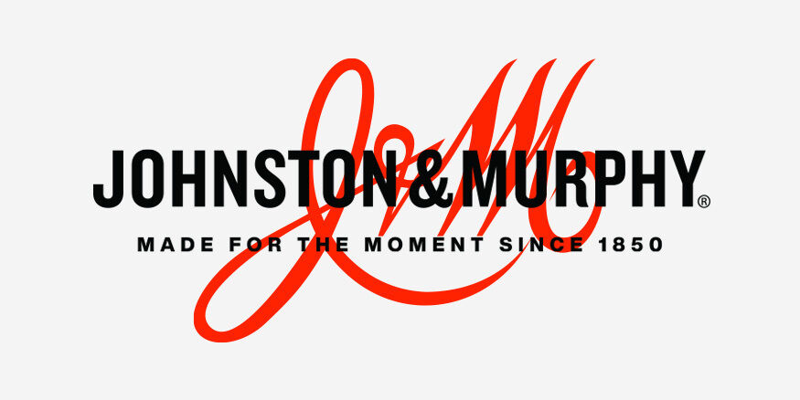 Johnston & Murphy white banner that reads "Made For The Moment Since 1850" with red J&M Logo in the background.